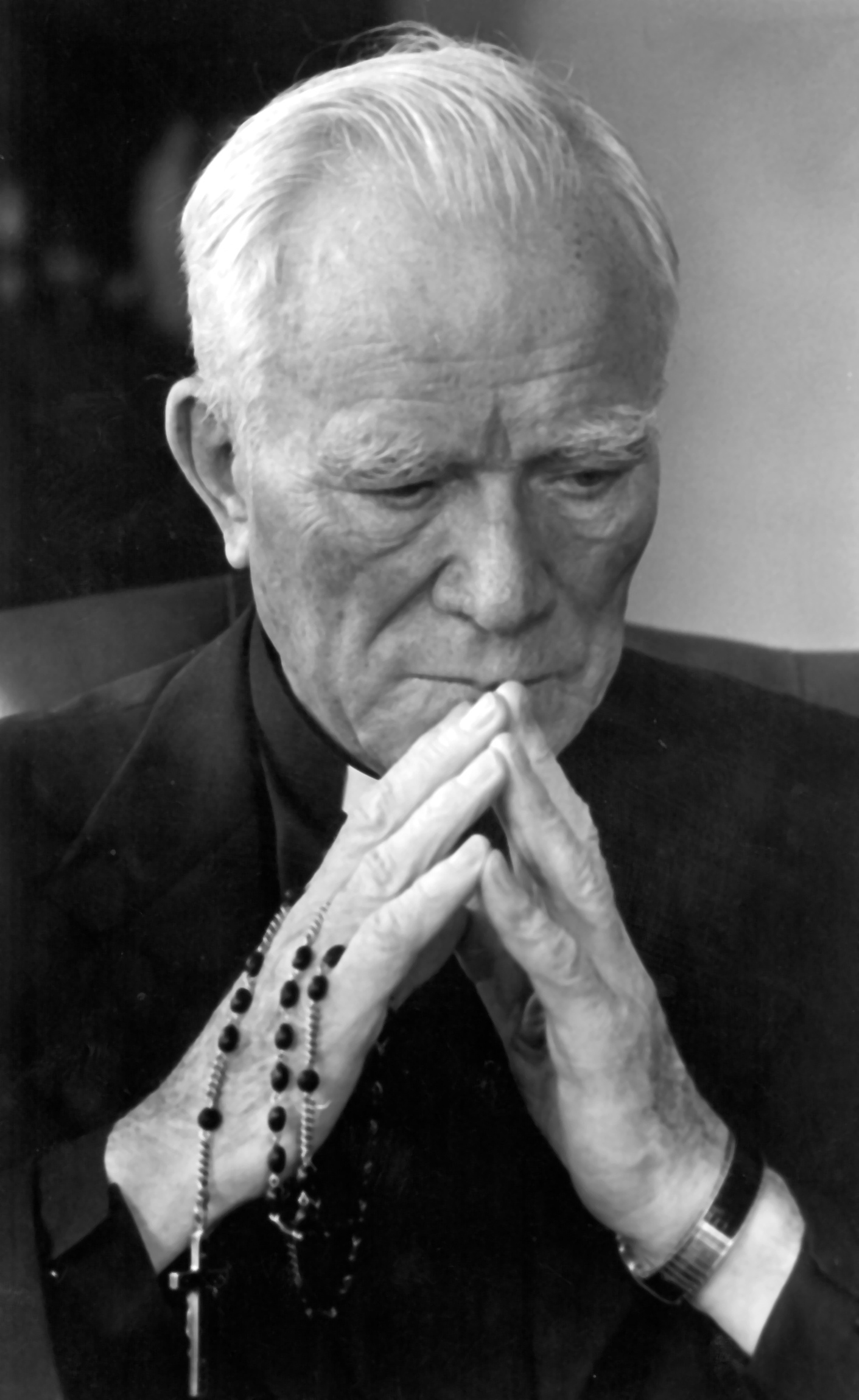 Fr
            Peyton with Rosary